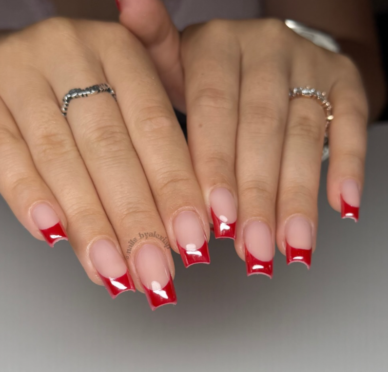 Elegant French manicure with cherry red tips and square nail shape